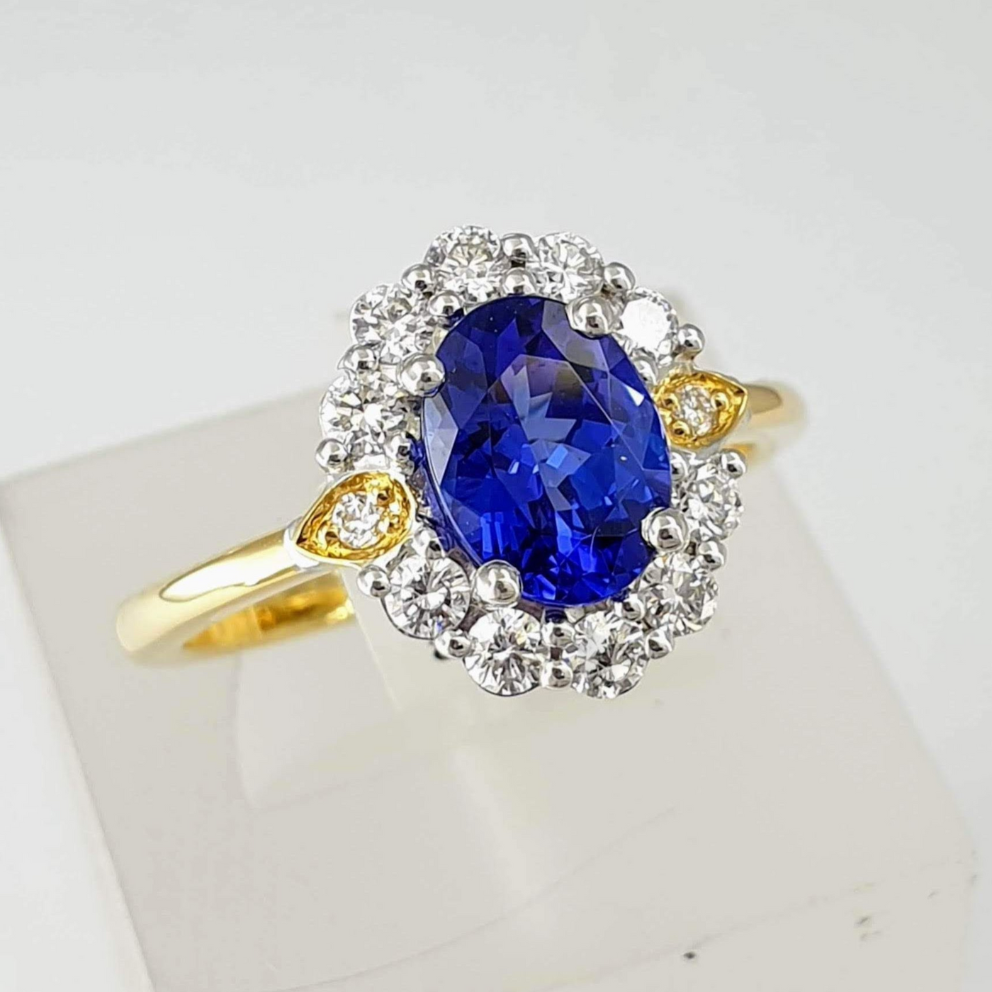 18ct Yellow and White Gold Tanzanite and Diamond Cluster Ring
