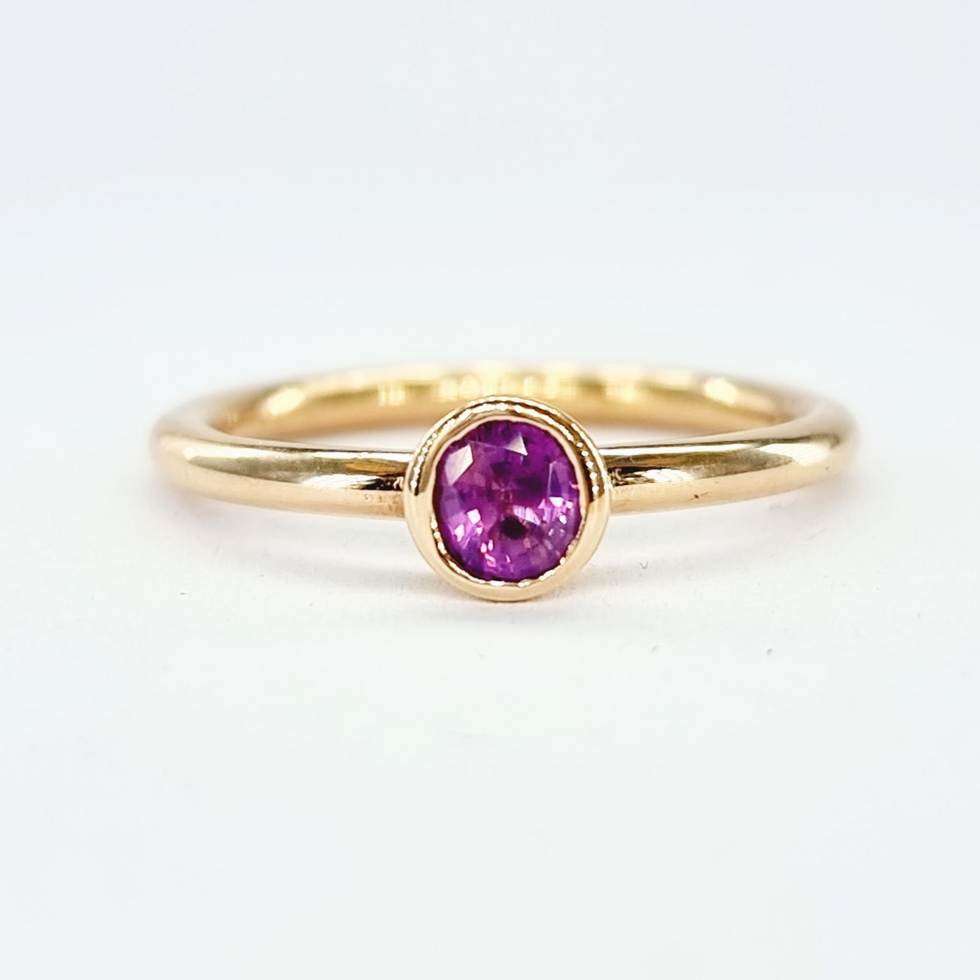 9ct Pink Gold Round Rubbed-in Set Pink Sapphire Ring