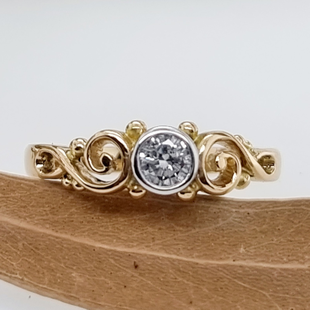 White and Yellow Gold Diamond Swirl Ring