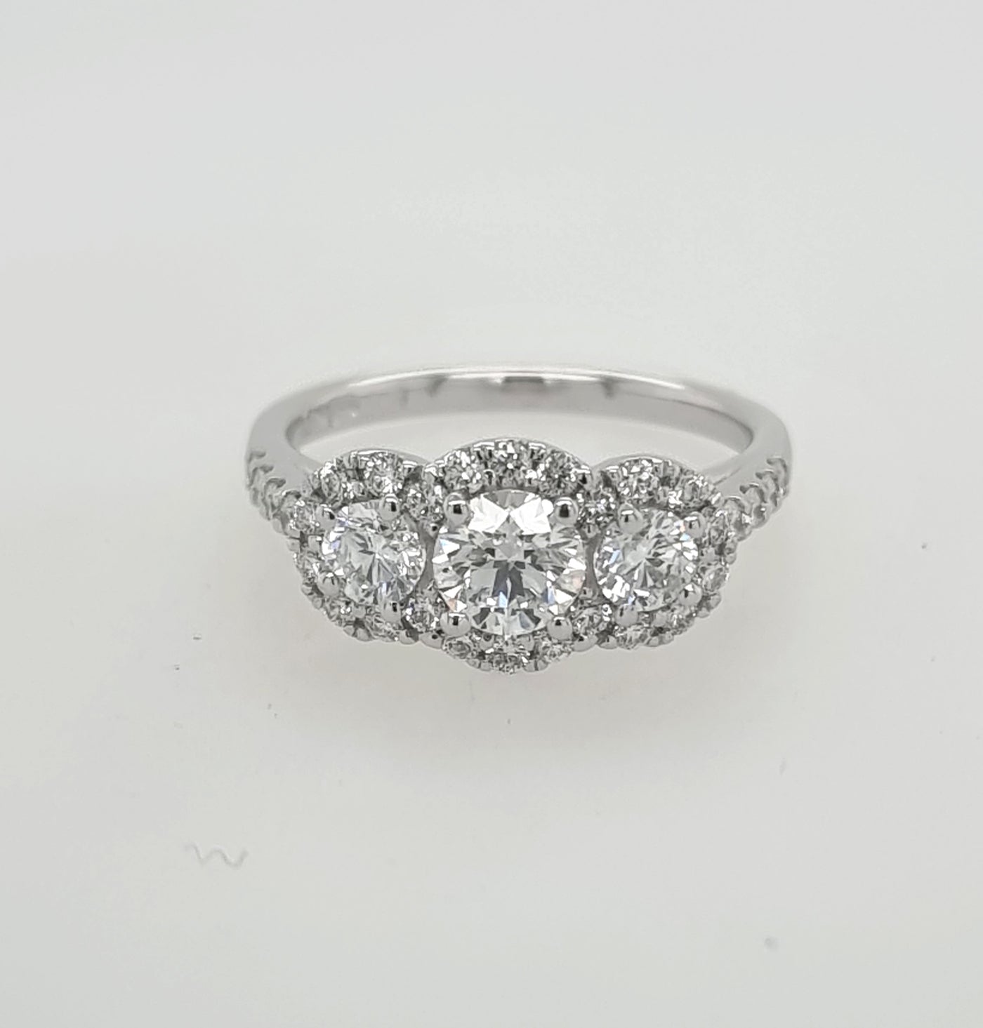 18ct White Gold Diamond Trilogy with Halo Ring