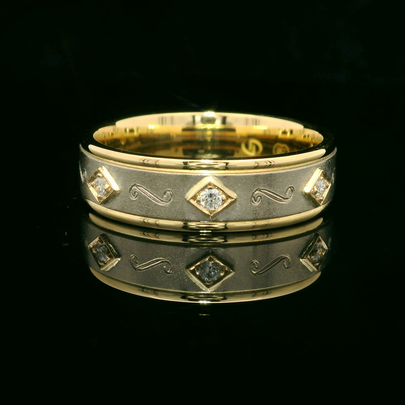 Yellow and White Gold ring with Filligree and Bezel set Diamonds