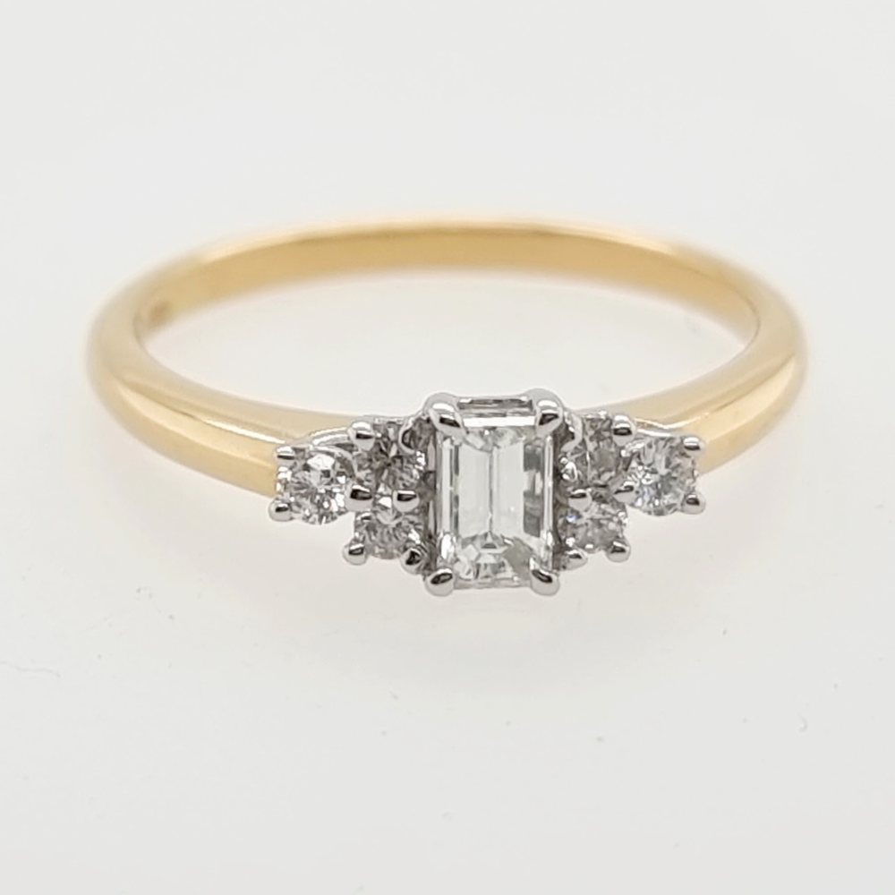 Emerald Cut Diamond Ring with Shoulder Stones
